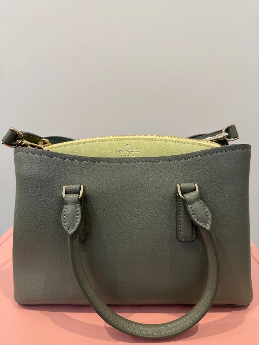 kate spade olive green leather satchel with yellow interior trim